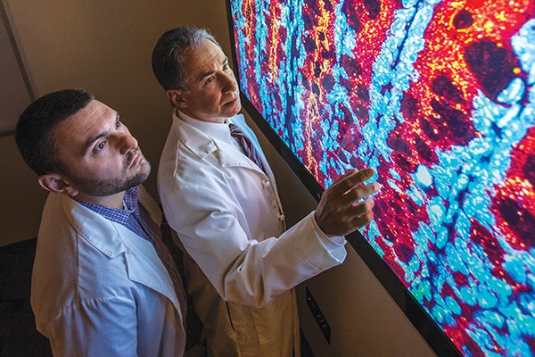 Scott Waldman, MD, PhD and Adam Snook, PhD