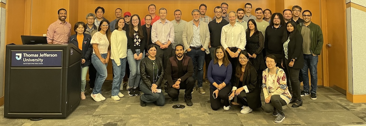 Group photo of the Aplin lab at a Joint Lab Retreat