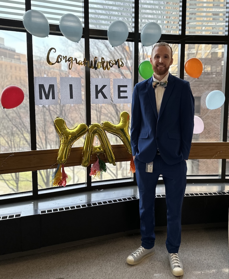 Michael Lawler at his thesis defense